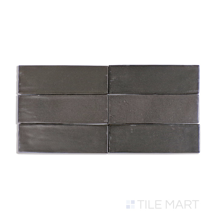 A detailed close-up of Celine Black 2X6 Matte Glazed Porcelain tile showcases its deep black shade and velvety matte texture, perfect for bold and elegant interiors.