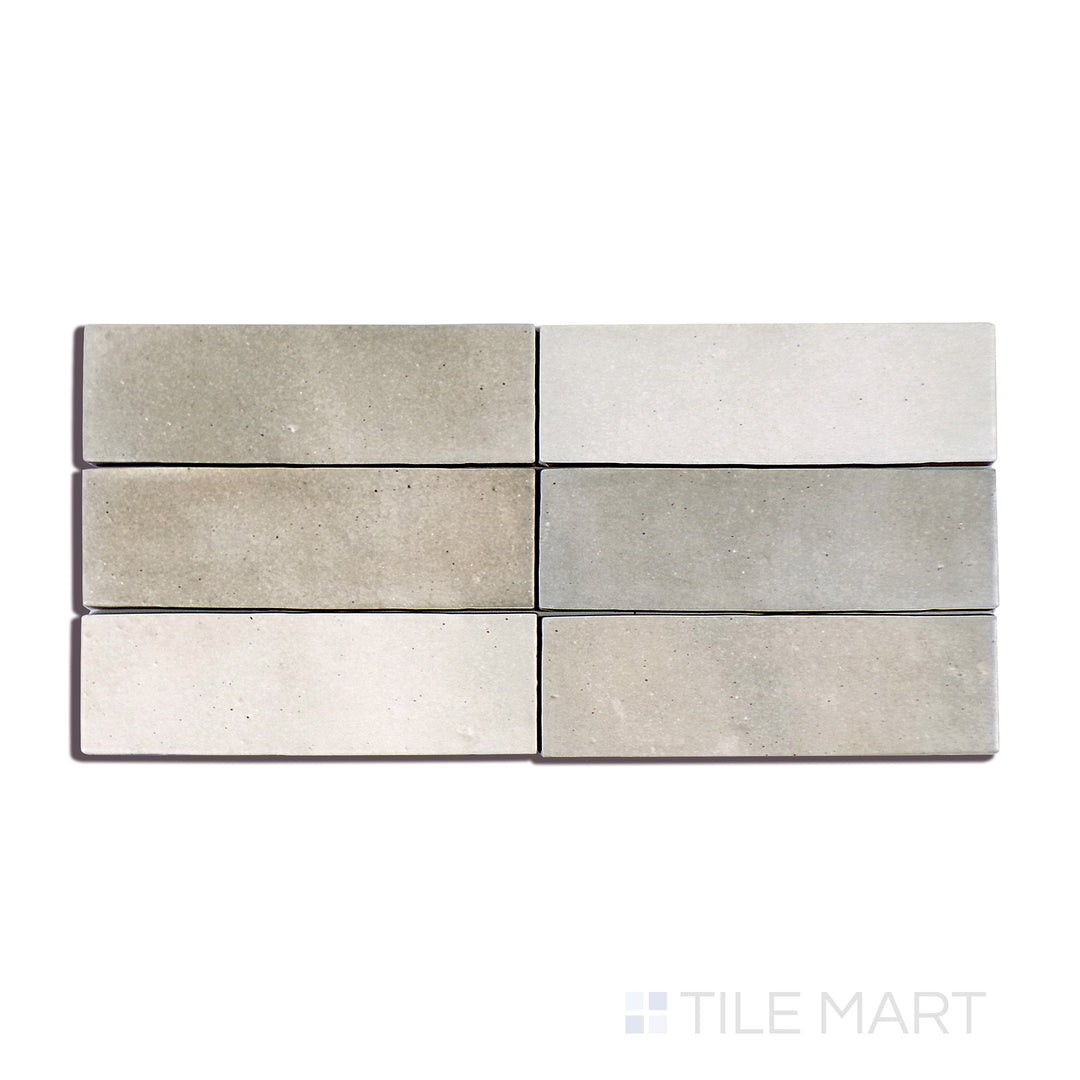 A zoomed-in shot of Celine Greige 2X6 Matte Glazed Porcelain tile showcases its neutral greige hue and velvety matte surface, perfect for modern and transitional designs.