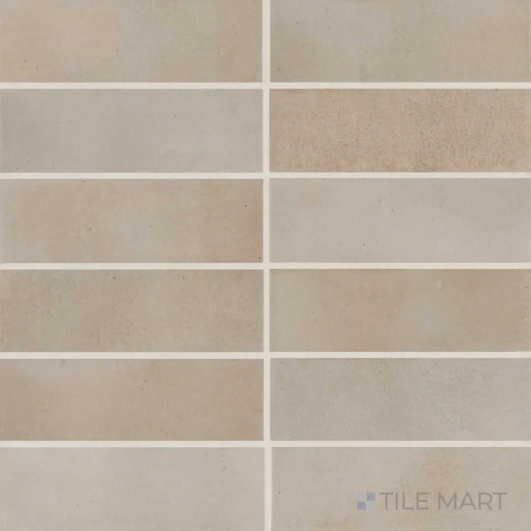 From a top-down perspective, the Celine Taupe 2x6 matte glazed porcelain tile exudes a warm, neutral taupe tone with a delicate matte glaze for a timeless appeal.