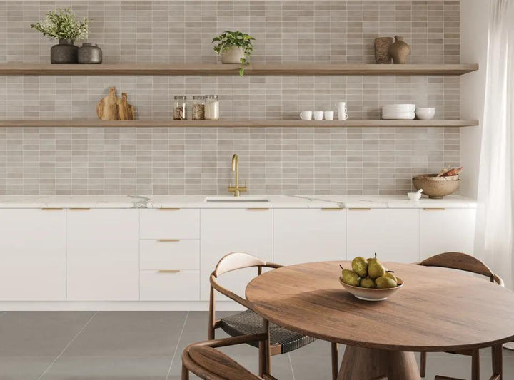 A neutral taupe shade that offers timeless elegance, complemented by Celine Taupe 2X6 Matte Glazed Porcelain.