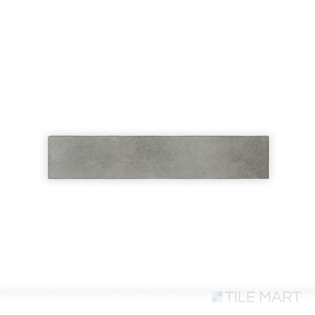 A close-up shot of Celine Greige 2.5X12 Matte Glazed Porcelain tile showcases its balanced greige tone and smooth matte glaze, blending warmth and modern appeal.