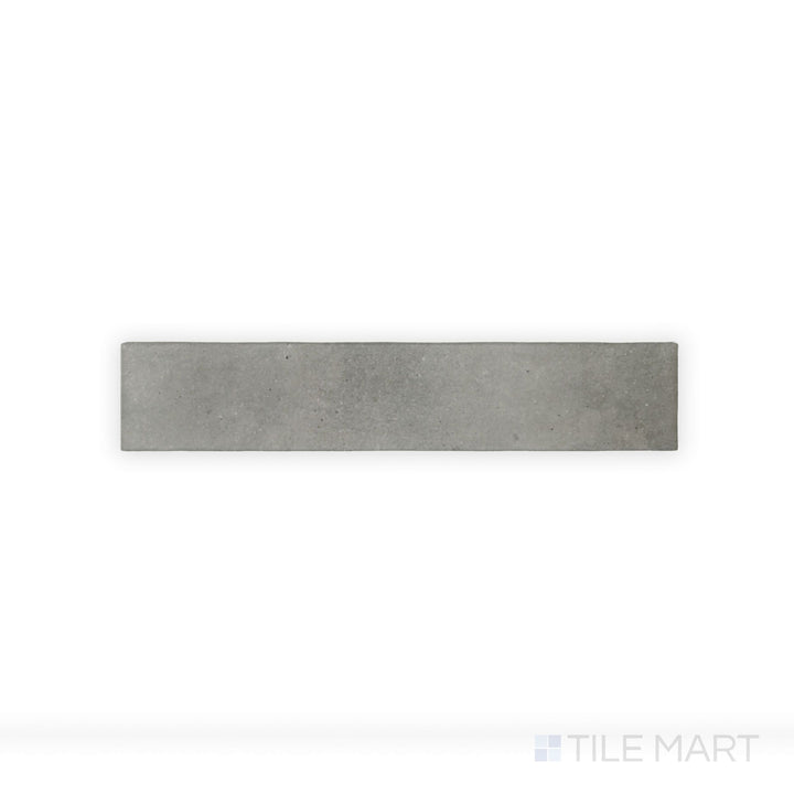 A close-up shot of Celine Greige 2.5X12 Matte Glazed Porcelain tile showcases its balanced greige tone and smooth matte glaze, blending warmth and modern appeal.