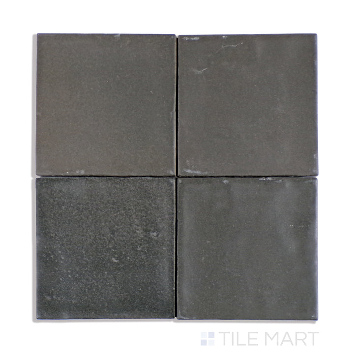 A close-up of Celine Black 4X4 Matte Glazed Porcelain tile highlights its rich black tone and velvety matte glaze, creating a sophisticated and modern aesthetic.