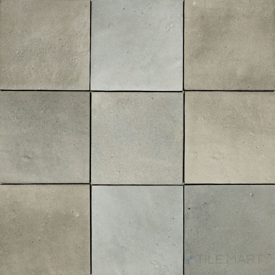A top-down perspective of the Celine Greige 4x4 matte glazed porcelain tile showcases its subtle blend of gray and beige tones, offering a neutral yet stylish look with a soft matte finish.