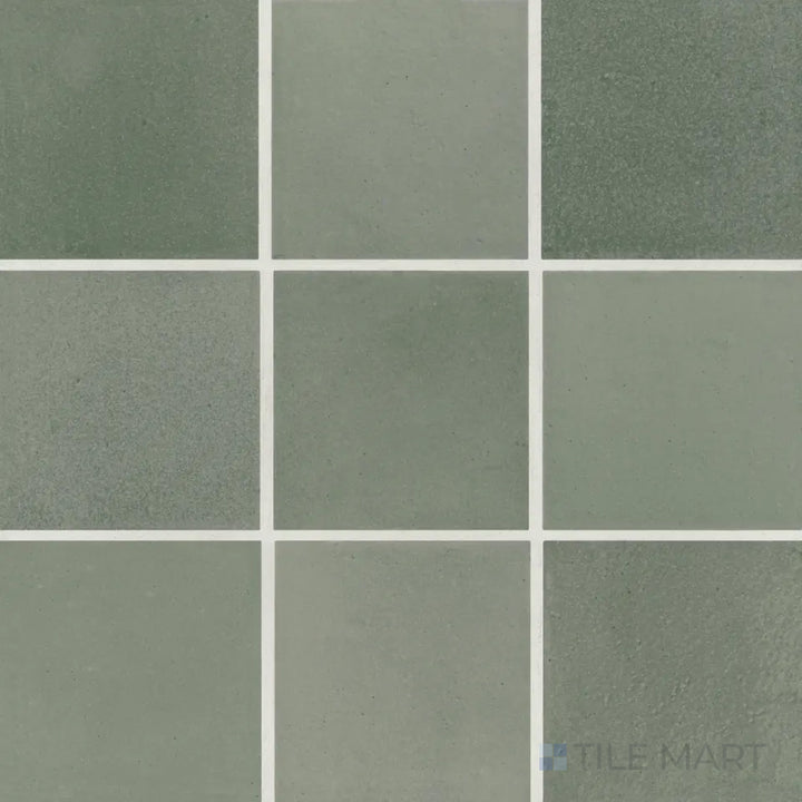 An aerial shot of the Celine Sage 4x4 matte glazed porcelain tile highlights its delicate green hue with a matte glaze, creating a serene and nature-inspired ambiance.