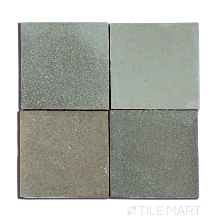 A zoomed-in shot of Celine Sage 4X4 Matte Glazed Porcelain tile emphasizes its muted green shade and soft matte glaze, bringing a refreshing organic touch.