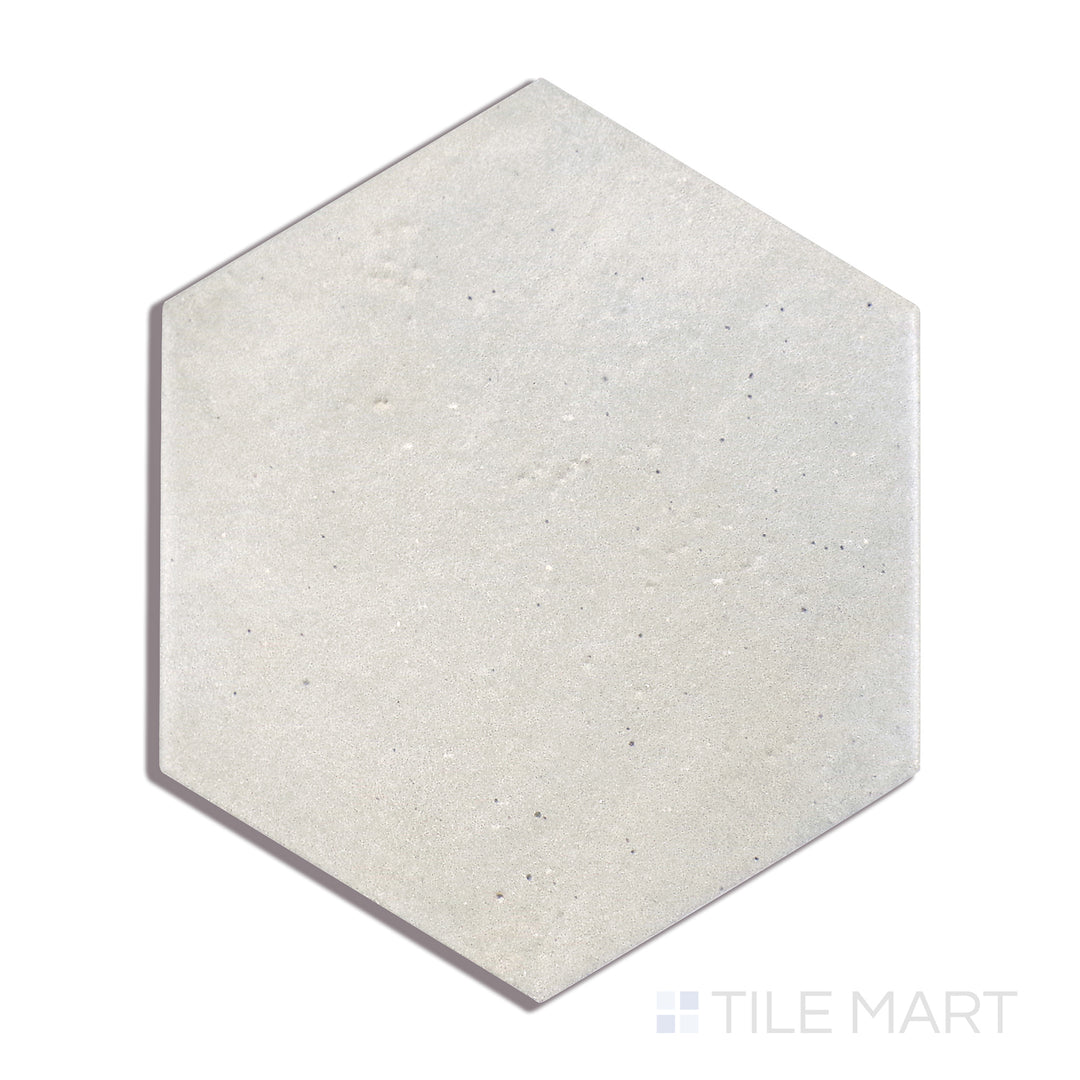 A macro shot of Celine Blue 4" Hex Matte Glazed Porcelain tile captures its deep blue hue and soft matte finish, perfect for accent walls and geometric layouts.