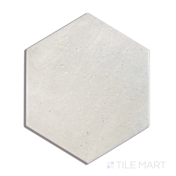 A macro shot of Celine Blue 4" Hex Matte Glazed Porcelain tile captures its deep blue hue and soft matte finish, perfect for accent walls and geometric layouts.