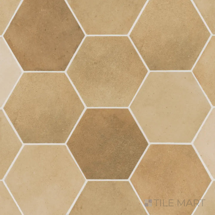 An overhead view of the Celine Cotto 4" hex matte glazed porcelain tile showcases its warm, earthy terracotta hue in a stylish hexagonal pattern, perfect for rustic charm.