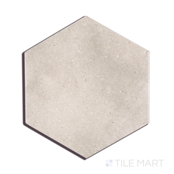 A finely detailed view of Celine Greige 4" Hex Matte Glazed Porcelain tile highlights its balanced greige tone and velvety matte surface, blending warmth with modern elegance.