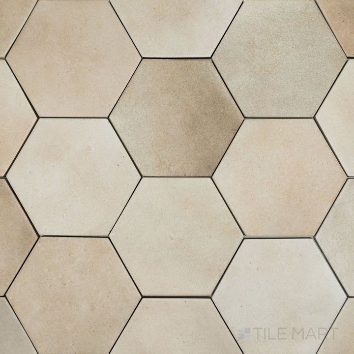 A bird’s-eye view of the Celine Taupe 4" hex matte glazed porcelain tile captures its warm taupe shade and subtle matte glaze, creating a refined and neutral foundation.