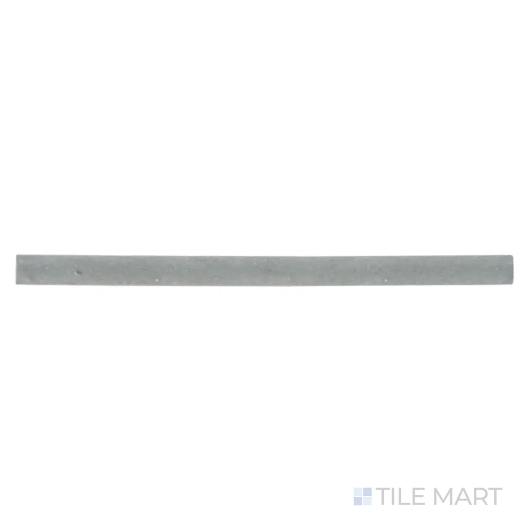 A top-view image of the Celine Blue 0.5X8 matte glazed porcelain Jolly trim tile showcases its rich blue hue, ideal for framing and finishing tile installations with a bold touch.