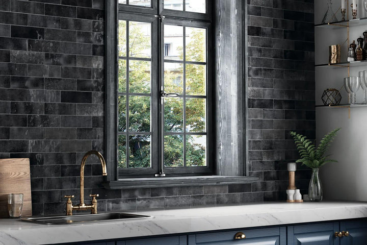 A rich and glossy black tone that adds depth and elegance, featuring Cloe Black 2.5X8 Gloss Glazed Ceramic.