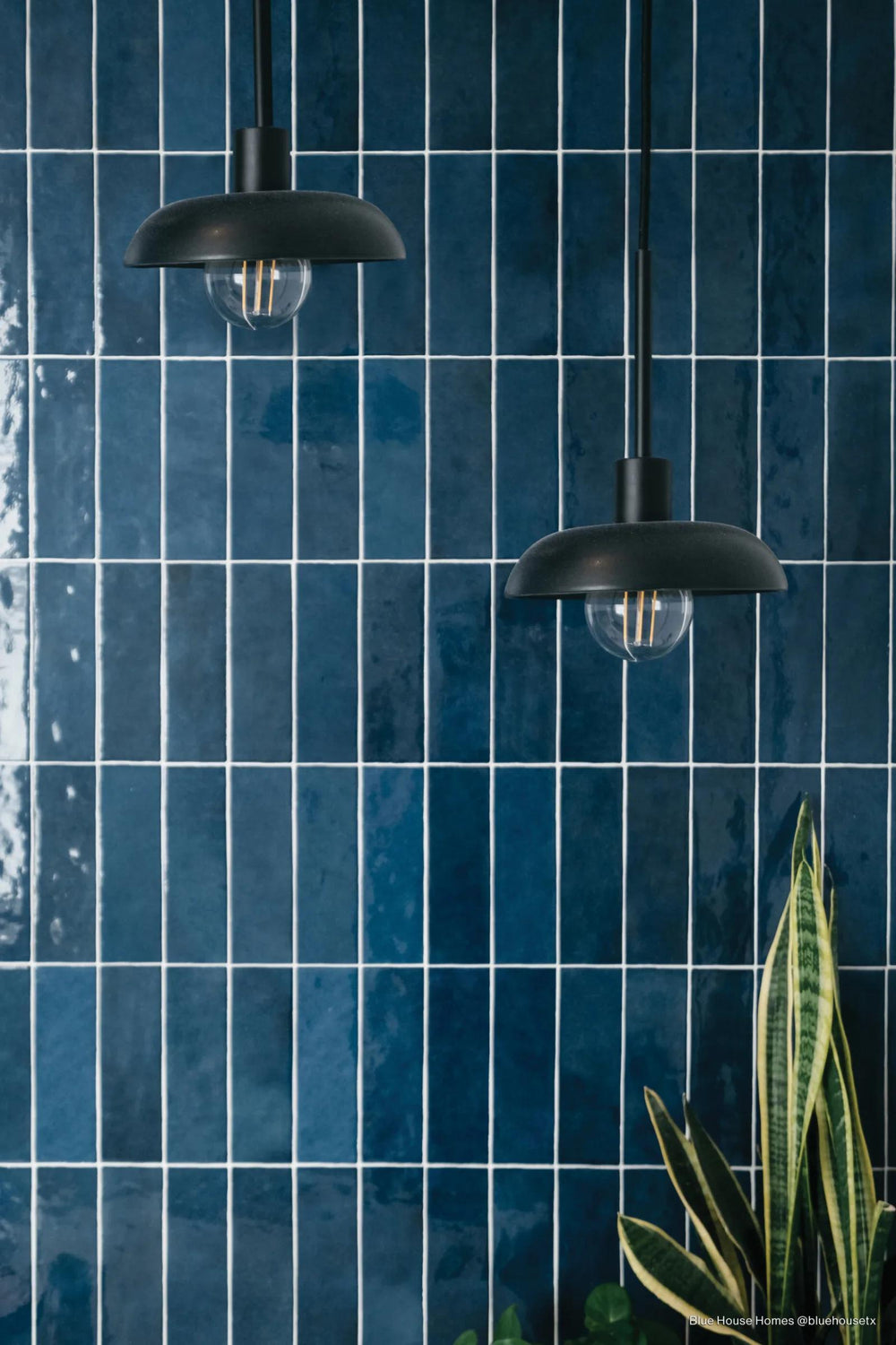 A deep and vibrant blue shade with a polished shine, complemented by Cloe Blue 2.5X8 Gloss Glazed Ceramic.