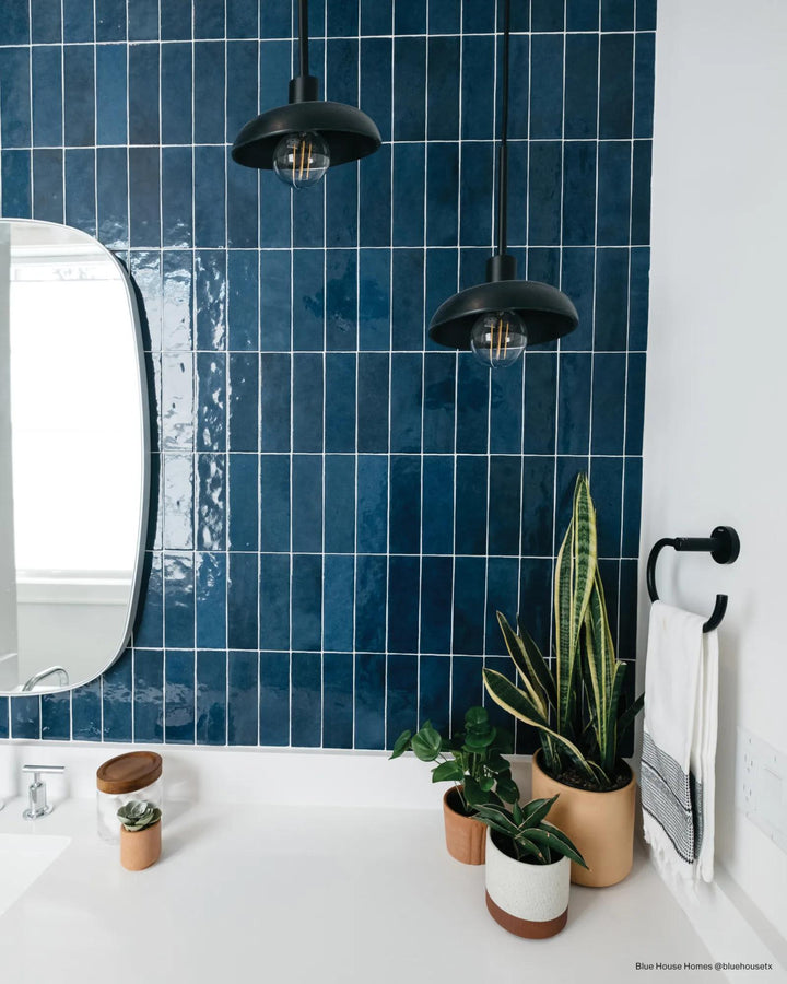 A lively and energetic space featuring Cloe Blue 2.5X8 Gloss Glazed Ceramic, adding a refreshing splash of color.