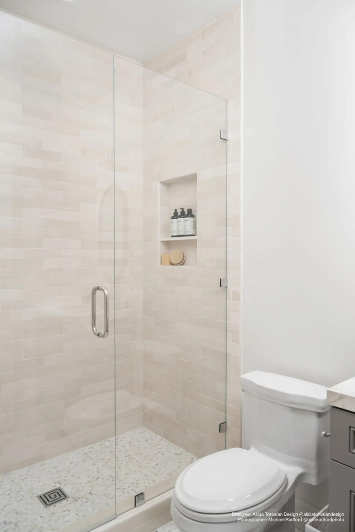 A warm and inviting aesthetic created with Cloe Crème 2.5X8 Gloss Glazed Ceramic, bringing a soft, neutral balance to interiors.