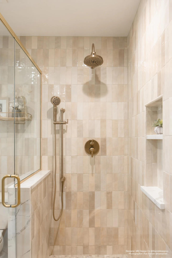 A soft crème shade with a high-gloss finish, Cloe Crème 2.5x8 ceramic tile delivers warmth and elegance.