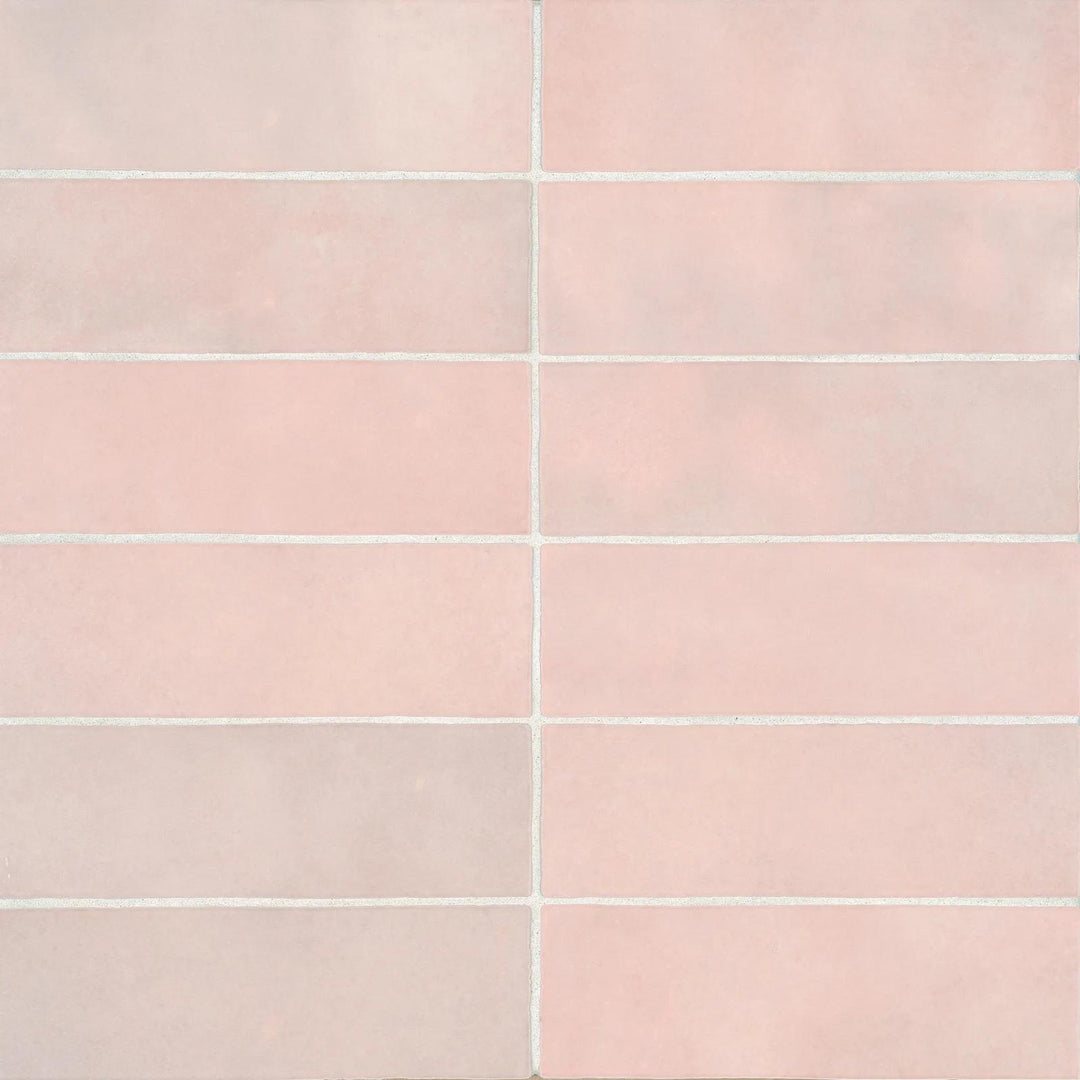 Seen from above, the Cloe Pink 2.5X8 glossy ceramic tile radiates a charming blush tone with a high-gloss finish, adding a playful yet sophisticated touch.