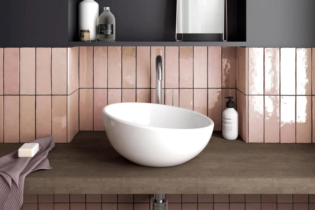 A delicate pink hue with a reflective glossy glaze, adding warmth and elegance with Cloe Pink 2.5X8 Gloss Glazed Ceramic.