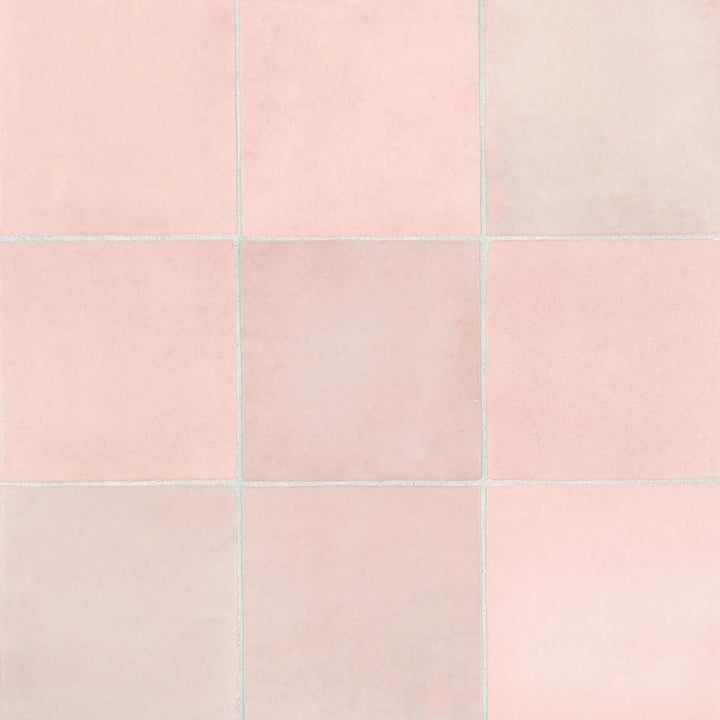 From above, the Cloe Pink 5X5 glossy ceramic tile radiates a soft blush tone with a lustrous finish, adding a playful yet elegant charm.