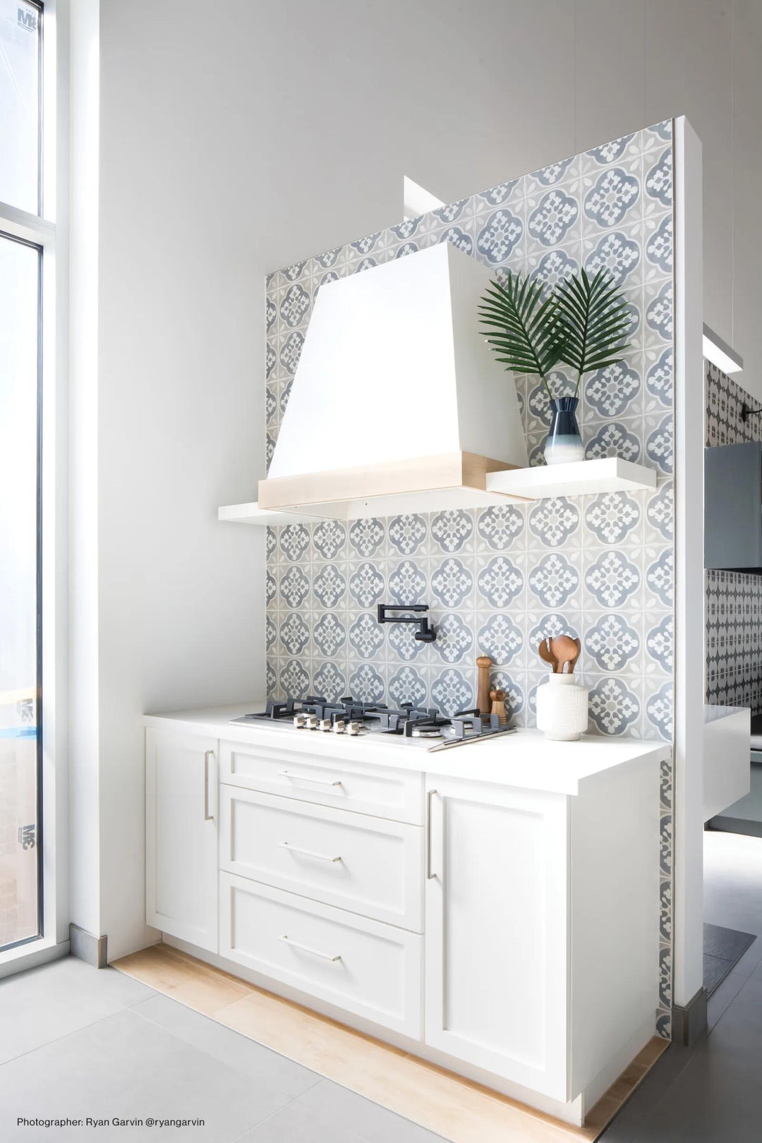 A soft, elegant matte finish enhances the space, blending seamlessly with Enchante Charm 8X8 Matte Glazed Color Body Porcelain.