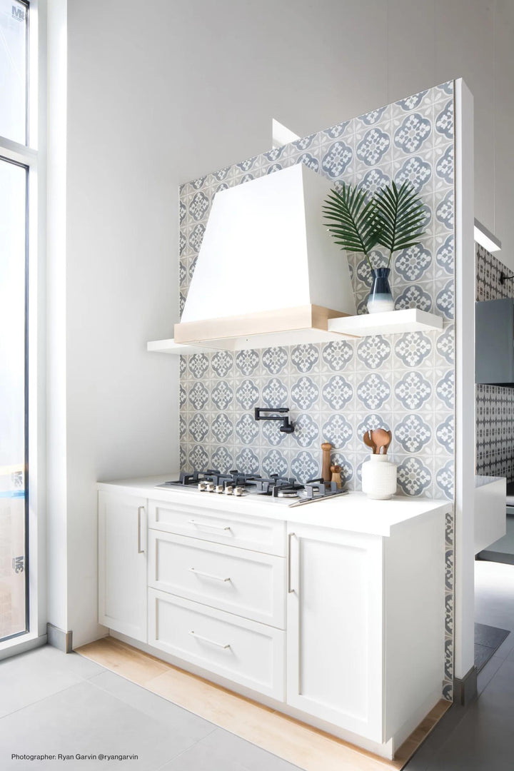 A soft, elegant matte finish enhances the space, blending seamlessly with Enchante Charm 8X8 Matte Glazed Color Body Porcelain.