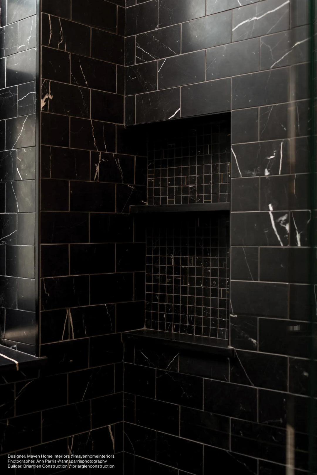 A deep black honed marble tile, Ferrara Nero 3x6 offers a classic and sophisticated aesthetic with rich natural veining.