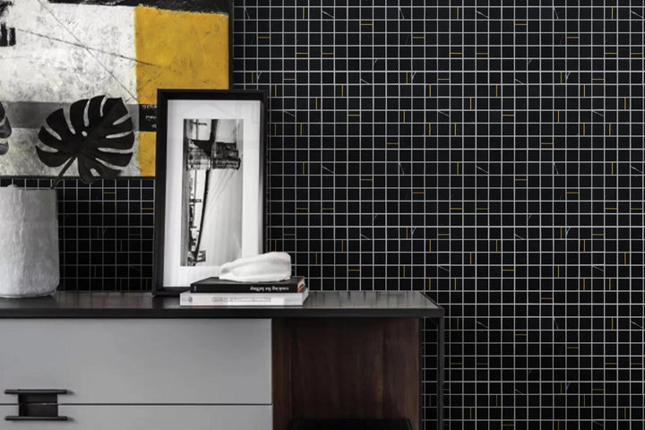 A bold nero marble square mosaic with brass inlays, offering a timeless look with Ferrara Nero 1" Square Honed Marble, Brass Mosaic.