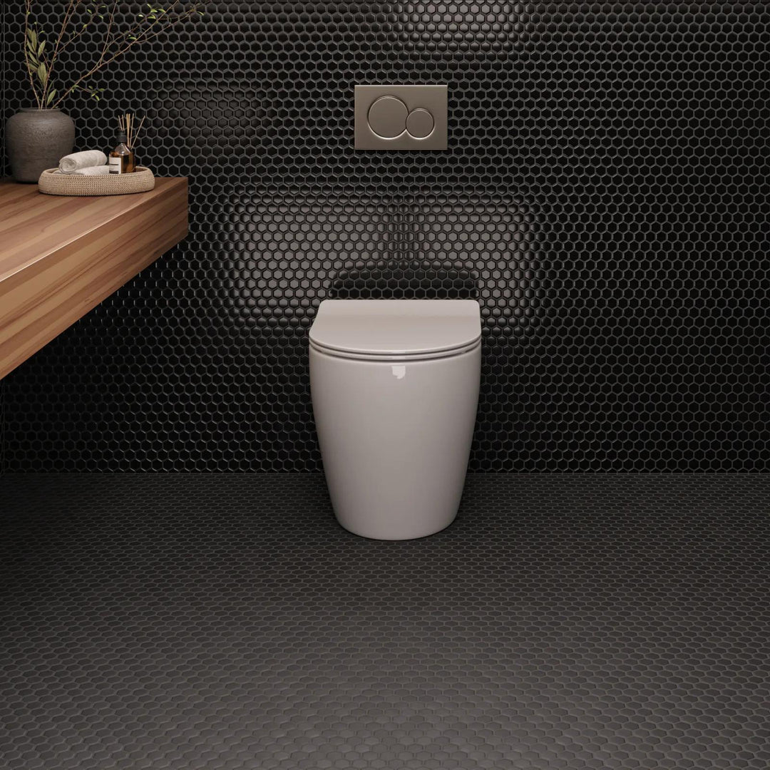 A sleek matte glazed porcelain mosaic featuring a 1-inch black hexagon design, adding a modern touch with Le Café Black 1" Hexagon Matte Glazed Porcelain Mosaic.