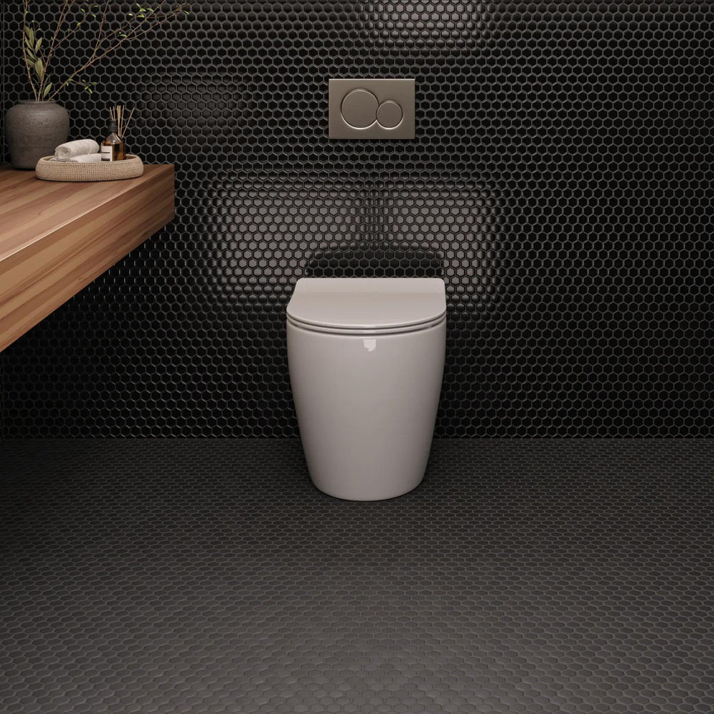 A glossy black hexagon mosaic in a 1-inch format, enhancing surfaces with a polished sheen in Le Café Black 1