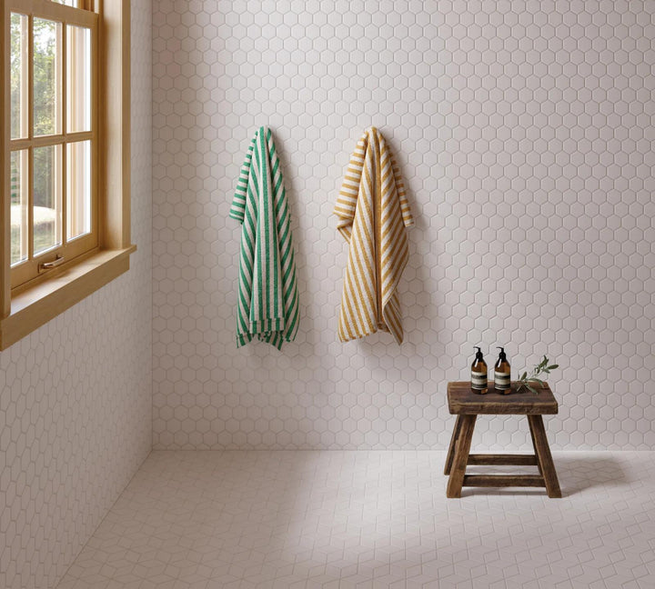 A minimalist white 2-inch hexagon mosaic with a matte glazed texture, creating a sophisticated backdrop with Le Café White 2" Hexagon Matte Glazed Porcelain Mosaic.