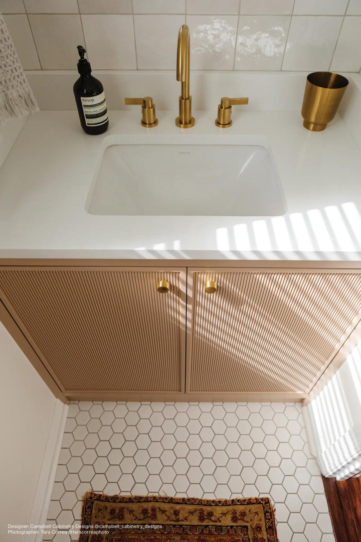 A crisp white hexagon matte porcelain mosaic, Le Café White 2" adds a timeless geometric touch with a clean, modern feel.