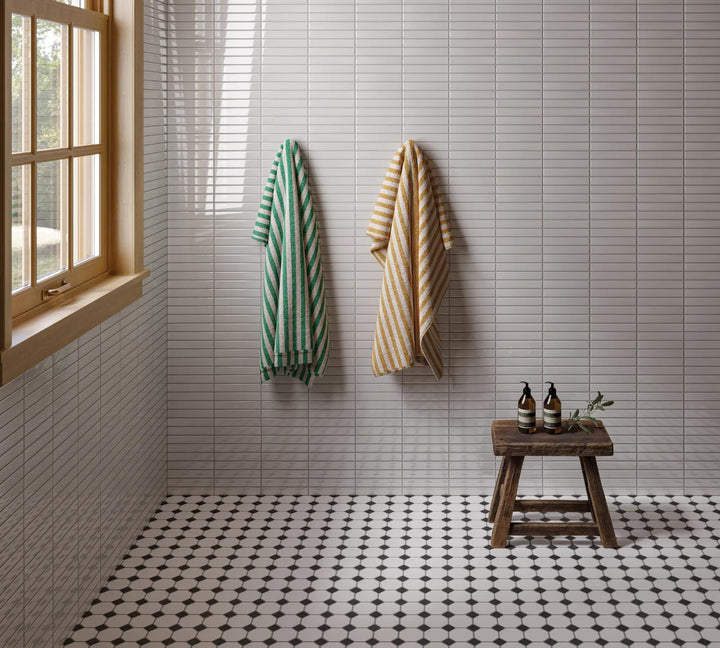 A crisp white straight stack mosaic with a glossy sheen, ideal for a clean and reflective surface with Le Café White Straight Stack Gloss Glazed Porcelain Mosaic.