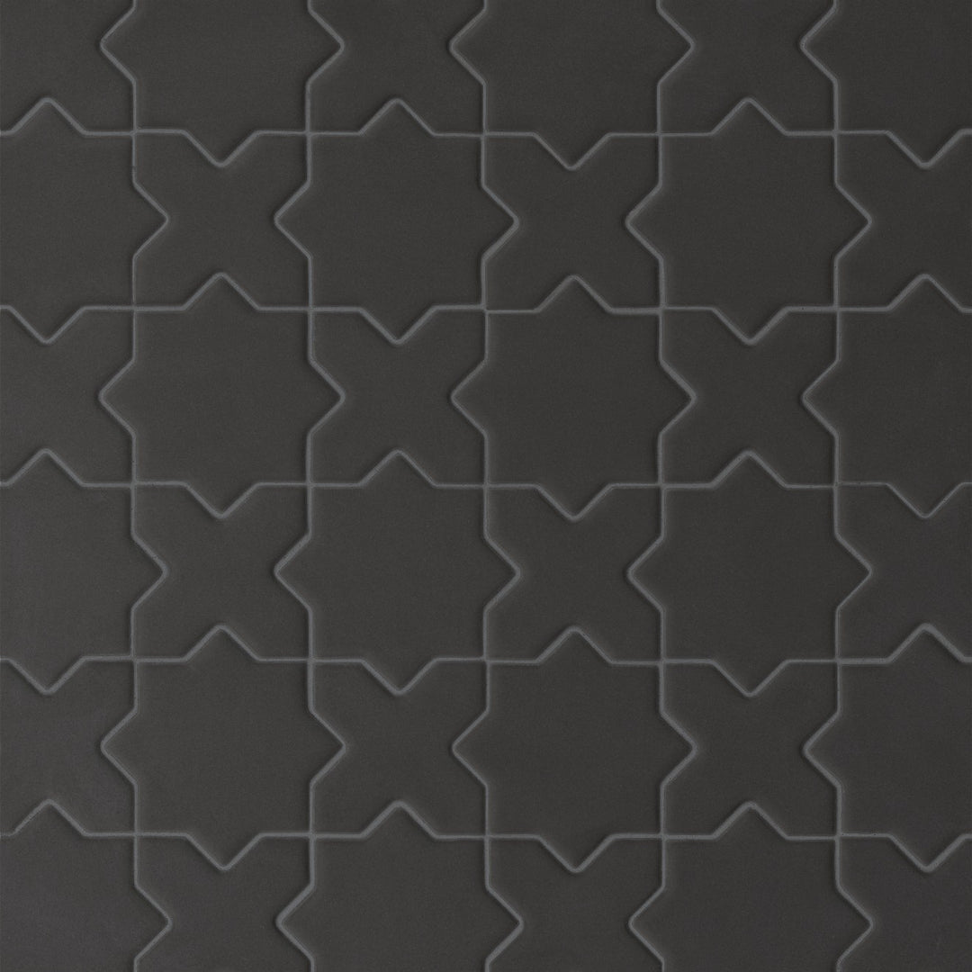 A top-down perspective of the Le Café Black Cross & Star Matte Porcelain Mosaic showcases a stunning interplay of crosses and star accents in a bold black matte finish, creating a striking geometric statement.