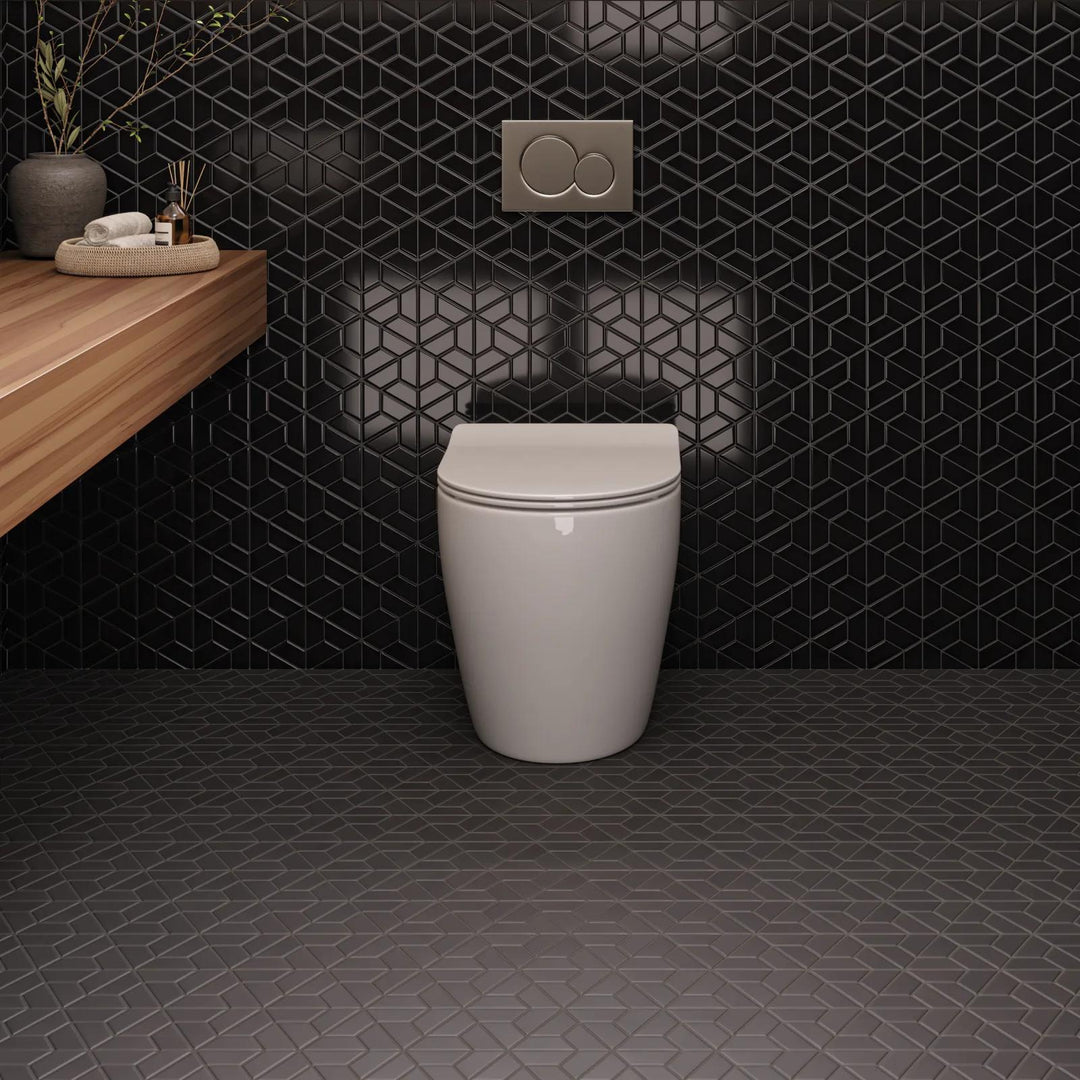 A sleek black half hexagon mosaic with a matte glazed finish, perfect for dynamic and modern layouts with Le Café Black Half Hexagon Matte Glazed Porcelain Mosaic.