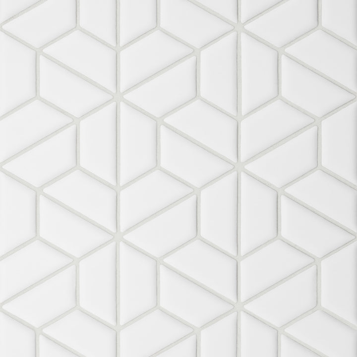 An overhead perspective of the Le Café White Half Hexagon Matte Porcelain Mosaic captures its dynamic half-hexagonal pattern in a soft white matte, providing a subtle yet visually captivating layout.