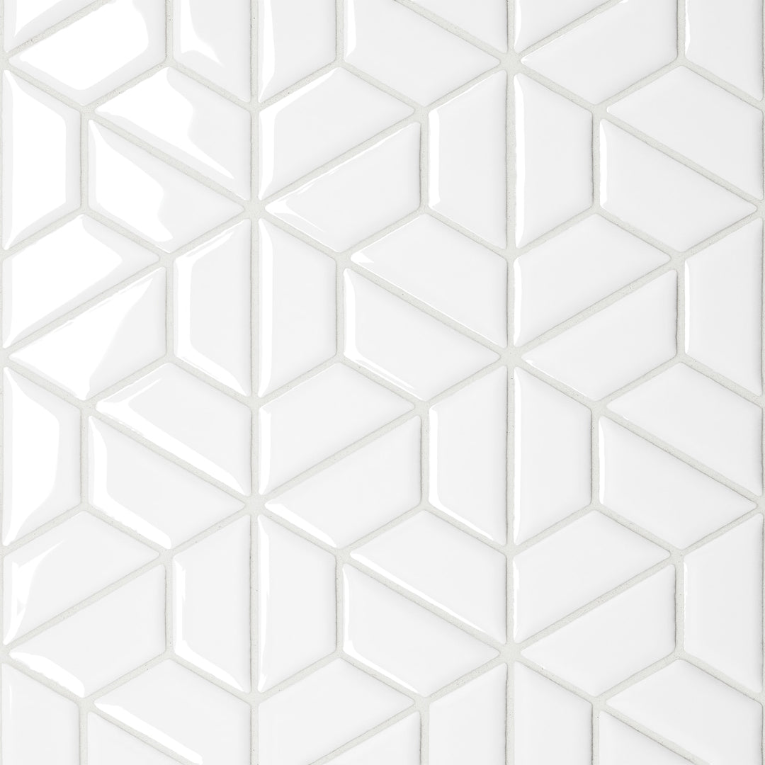 A direct aerial view of the Le Café White Half Hexagon Gloss Porcelain Mosaic showcases its luminous white glaze, reflecting light beautifully across the structured half-hexagonal pattern for a modern touch.