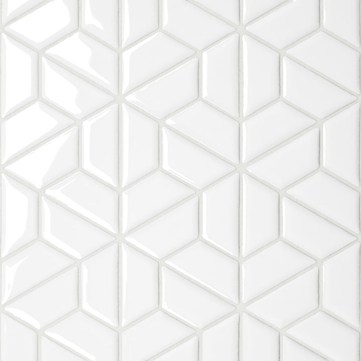 A direct aerial view of the Le Café White Half Hexagon Gloss Porcelain Mosaic showcases its luminous white glaze, reflecting light beautifully across the structured half-hexagonal pattern for a modern touch.