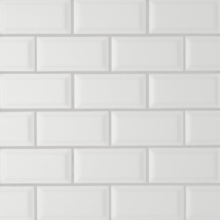 Captured from above, the Le Café White Bevel Offset matte mosaic presents its crisp white tone and beveled edges, offering a clean, modern elegance with subtle depth.