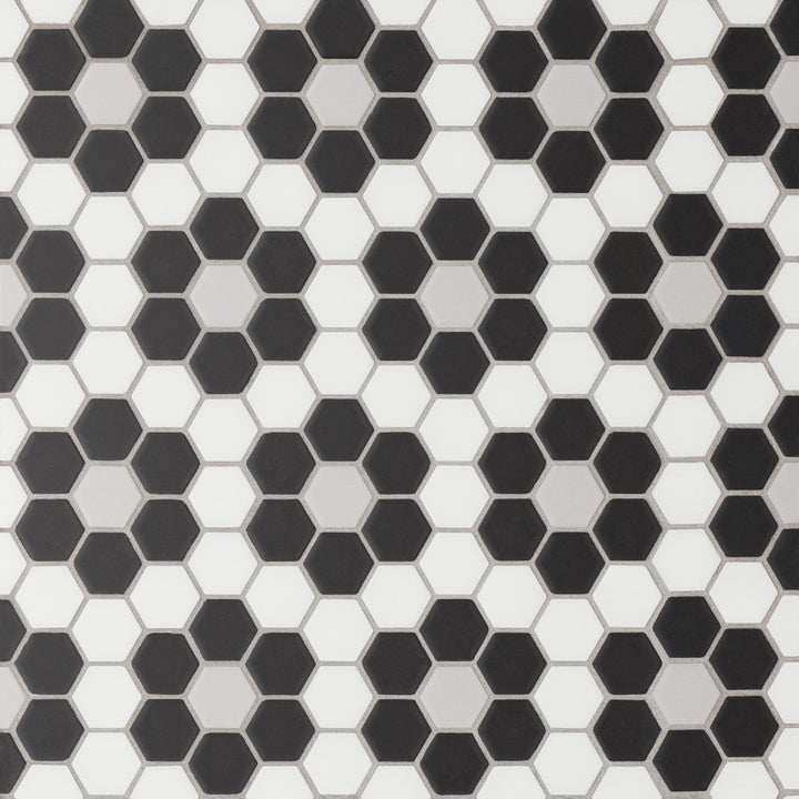 From above, the Le Café Deco 1" Hexagon Design 6 matte mosaic exhibits a fine balance of intricate patterns and a soft matte glaze, creating a refined textural statement.