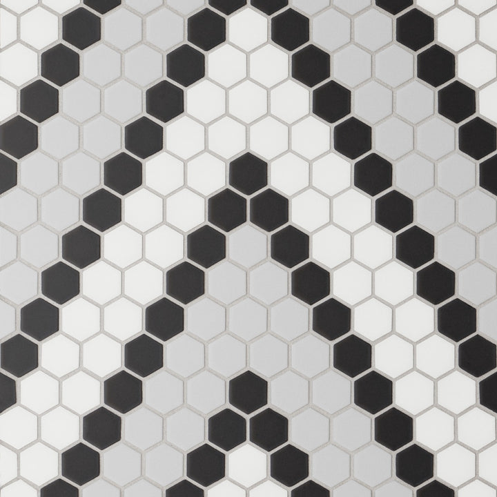 A top-down view of the Le Café Deco 1" Hexagon Design 8 matte mosaic showcases a seamless pattern, delivering a modern, minimalist appeal with depth and contrast.