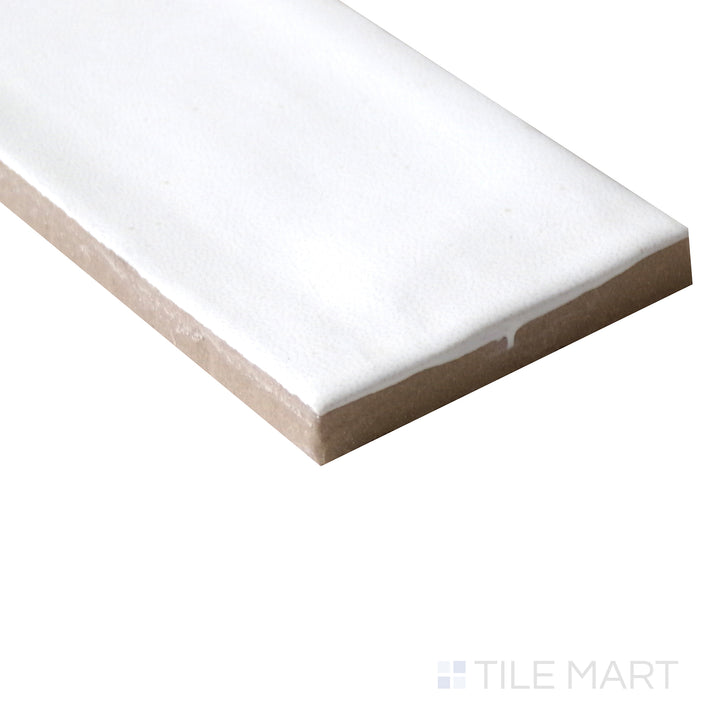 Corner shot of Makoto Shoji White 2.5x10 matte ceramic tile, featuring a clean white surface, smooth matte finish, and well-defined edges forming a precise junction.