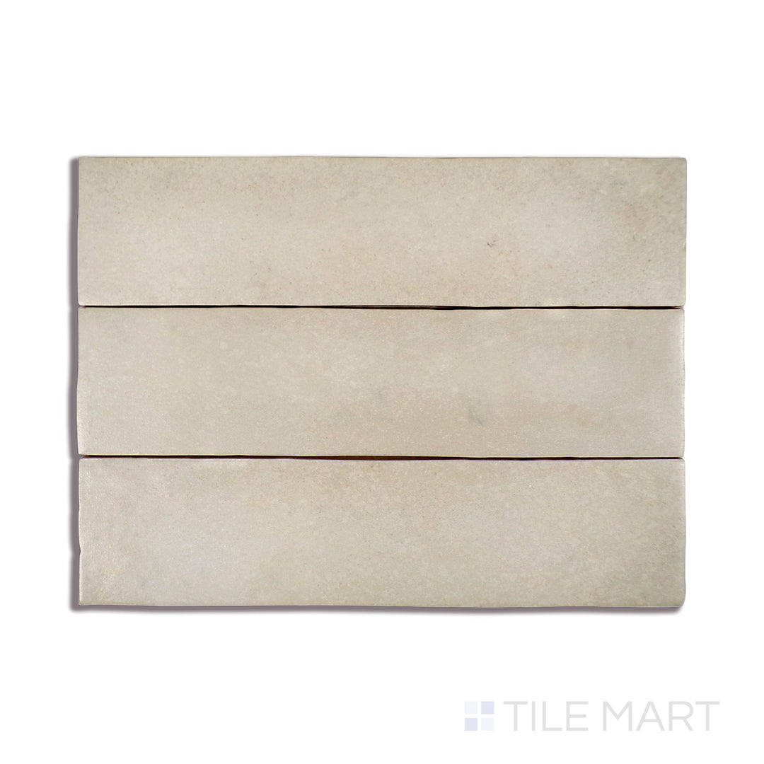 A close-up perspective of Makoto Tatami Beige 2.5X10 Matte Ceramic tile reveals its warm, earthy beige tone and velvety matte texture, bringing organic charm to any design.