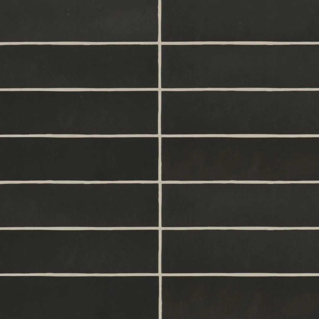 An aerial view of the Makoto Kuroi Black 2.5X10 matte ceramic tile reveals its deep, velvety black finish, bringing a bold and contemporary statement to any space.