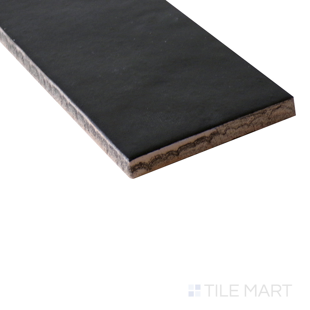 Corner-focused image of Makoto Kuroi Black 2.5x10 matte ceramic tile, emphasizing its bold black shade, crisp matte texture, and sharp edge detailing.