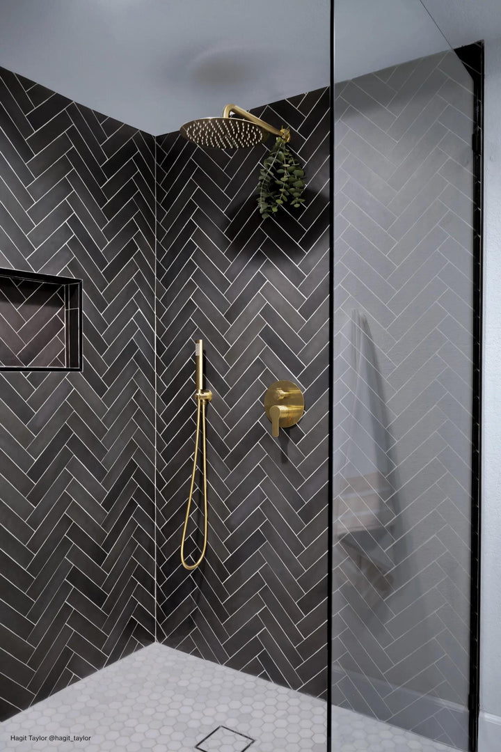 A deep black matte ceramic tile, Makoto Kuroi Black 2.5x10 creates a bold and elegant contrast.