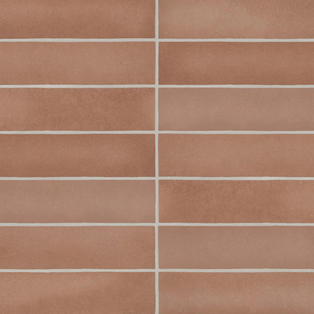 From a top-down perspective, the Makoto Umi Terracotta 2.5X10 matte ceramic tile showcases its earthy reddish-brown hue, inspired by sunbaked clay and natural elements.