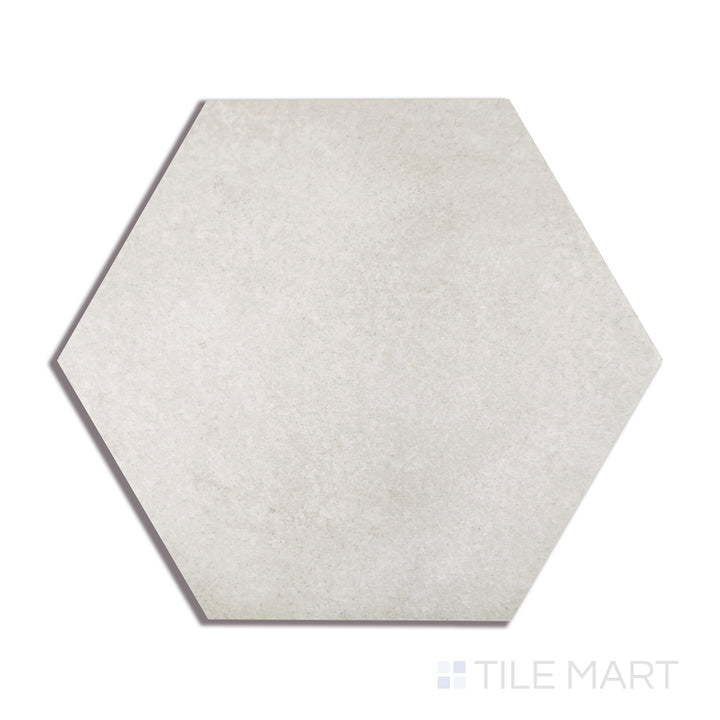 A finely detailed close-up of Makoto Kumo Grey 10" Hex Matte Porcelain tile highlights its cool grey tone and smooth matte surface, perfect for subtle yet sophisticated designs.