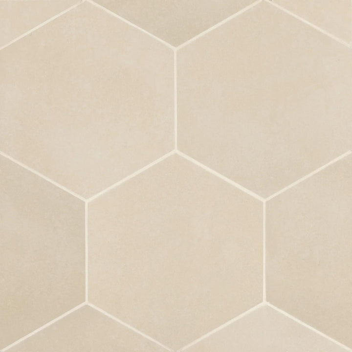 Captured from above, the Makoto Tatami Beige 10" hex matte porcelain tile echoes natural fibers, offering a warm neutral tone that blends tradition with contemporary style.