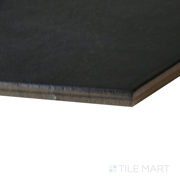 Corner-focused image of Makoto Kuroi Black 10" hex matte porcelain tile, highlighting its deep black shade, structured layout, and seamless alignment at the corner.